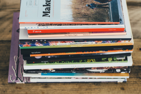 Stack of magazines on a table